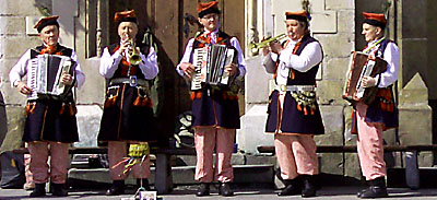 Krakow folk ensemble on the central square Krakow's street artists, a folk ensemble