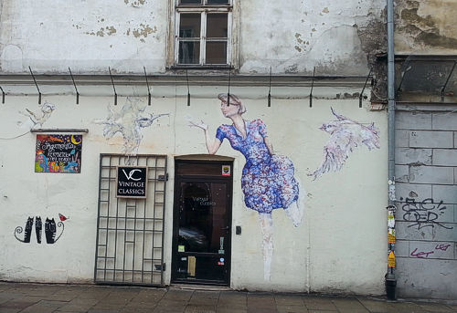 Graffiti advertisement of a Krakow shop